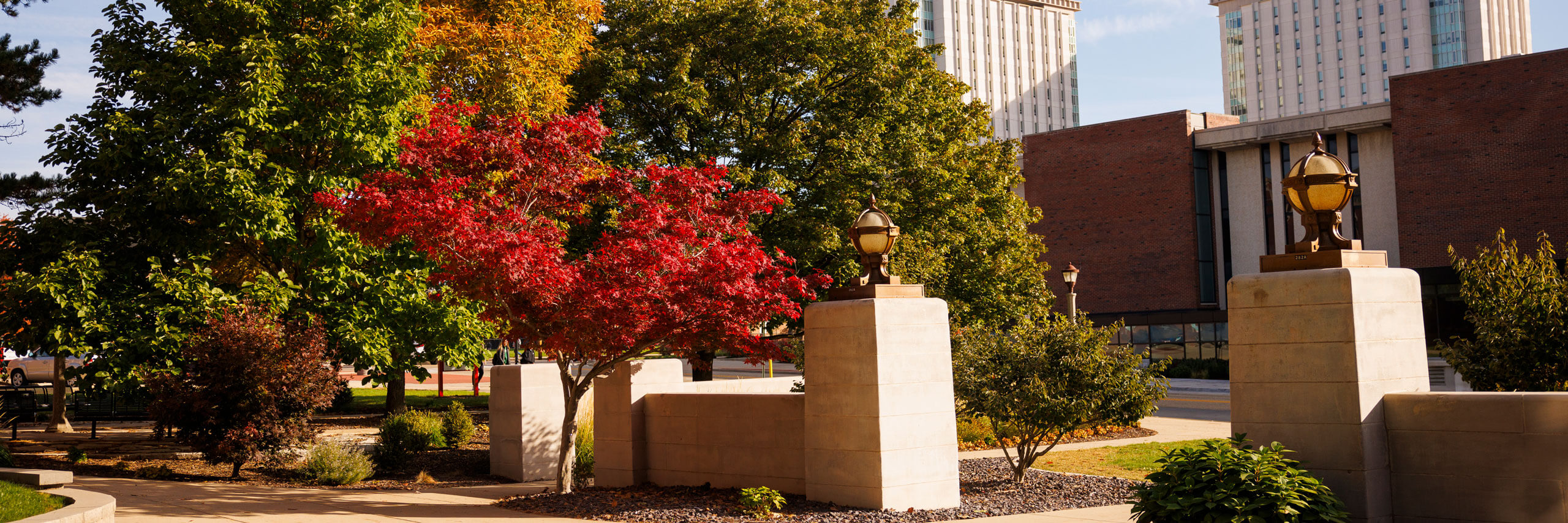 The sidewalk surrounding the Fell Gates outside of Hovey Hall.